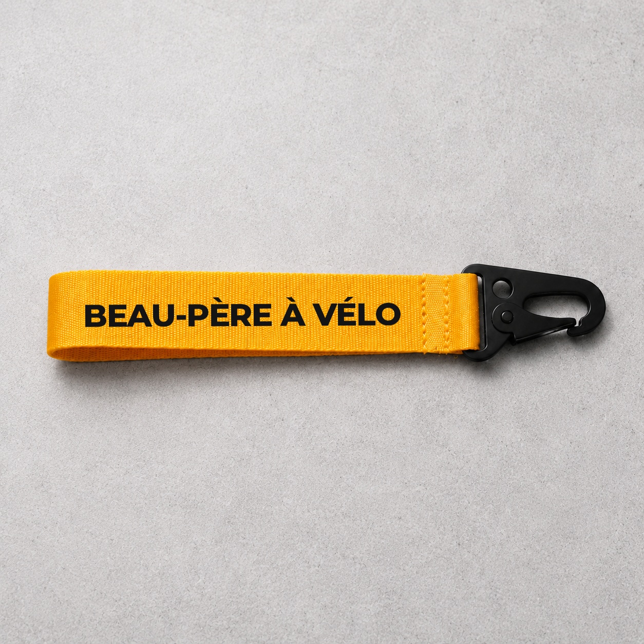 Porte-clé Beau-Père À vélo jaune