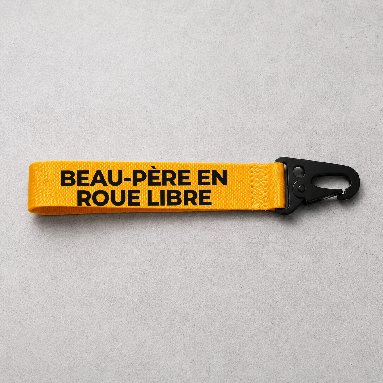 Porte-clé Beau-Père En roue libre jaune
