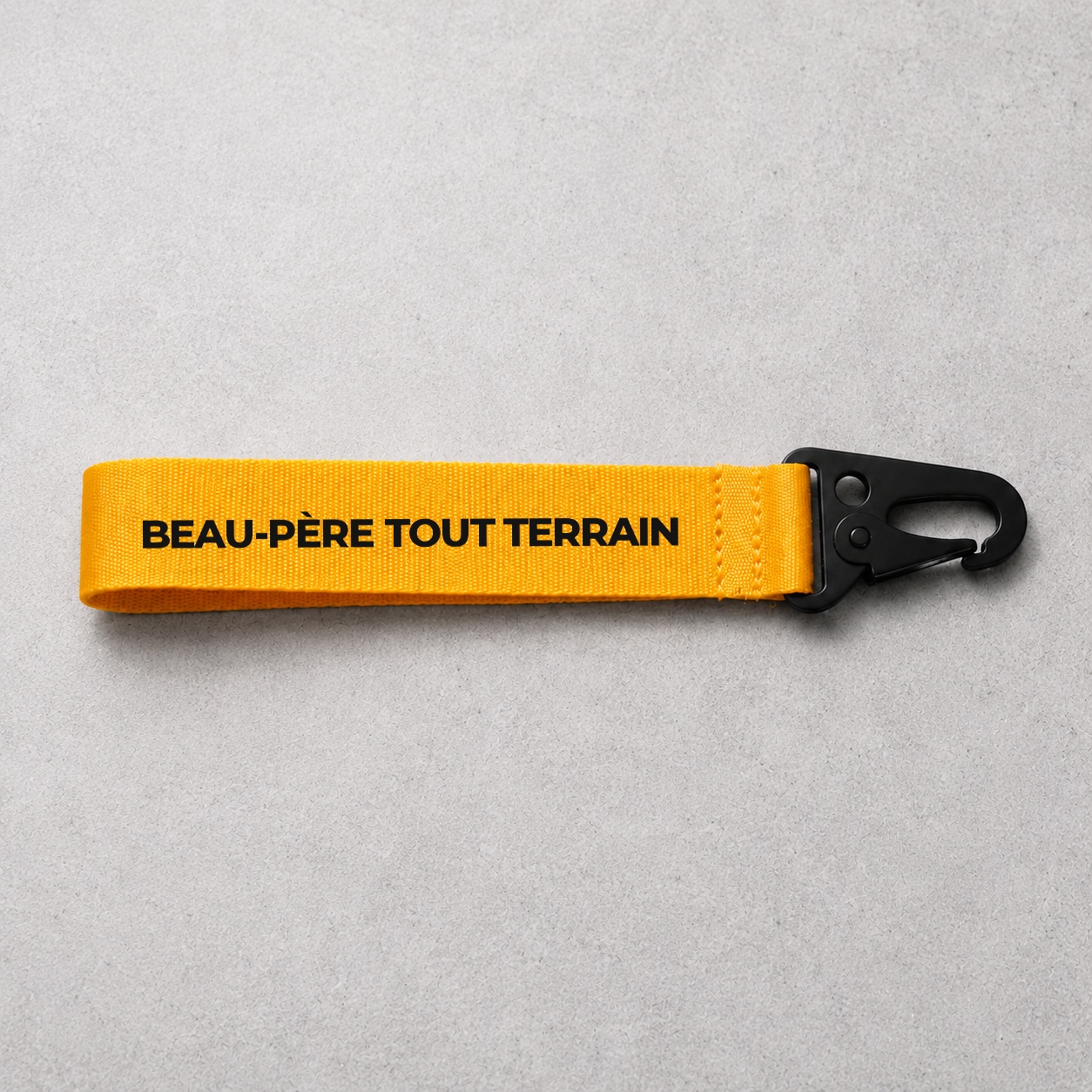 Porte-clé Beau-Père Tout terrain jaune