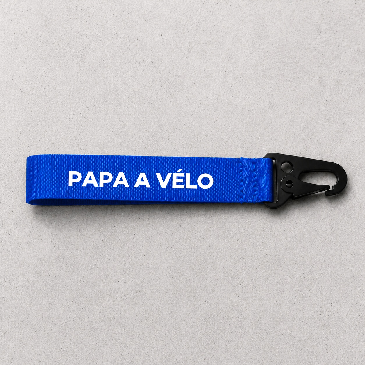Porte-clé Papa a vélo bleu